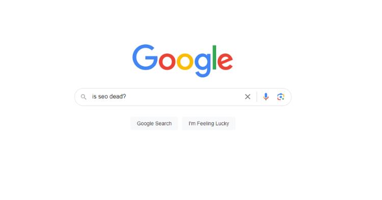 Google homepage with the search query "is seo dead?" typed into the search box
